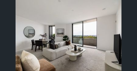 Sleek Top-Floor Sanctuary With City Skyline Vistas - Photo 4