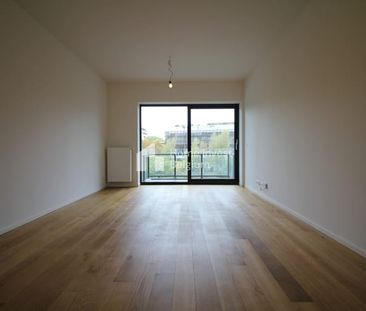 Appartement te huur - foto 2