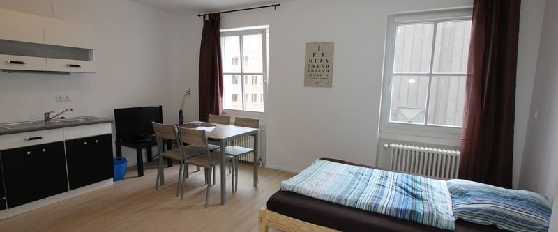 ModernesBusiness-Apartment im Herzen der Altstadt - Photo 1