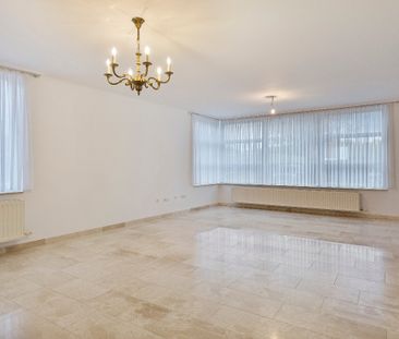 Ruim gelijkvloers appartement met veranda en 2 slaapkamers - Photo 4