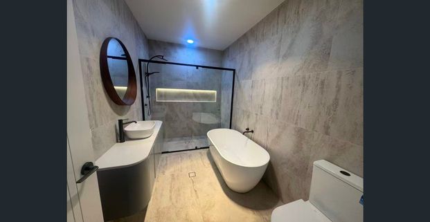 Beautifully Designed New Home in a Peaceful Urban Setting - Photo 1