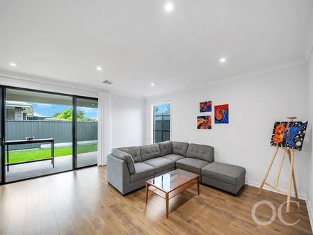 Open the Door to Sun-Soaked Living in a Premium Woodville West Pocket - Photo 3