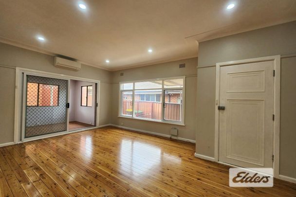 Freshly Updated Family Home in a Convenient Regents Park Location - Photo 1