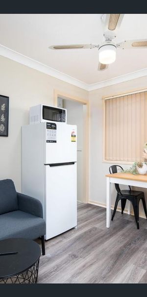 Fully Furnished Studio Living with Utilities | Forest Lake - Photo 1