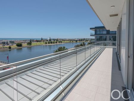 Open the Door to Luxurious Sub-Penthouse Living with Panoramic Coastal and River Views - Photo 2