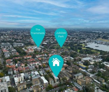 Light and bright top floor two bedroom - Photo 1