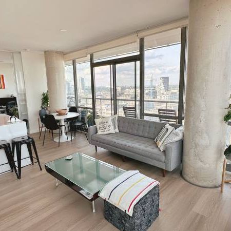 Elegant 2 Bed, 2 Bath Corner Suite with Waterfront Views and Patio - Photo 4