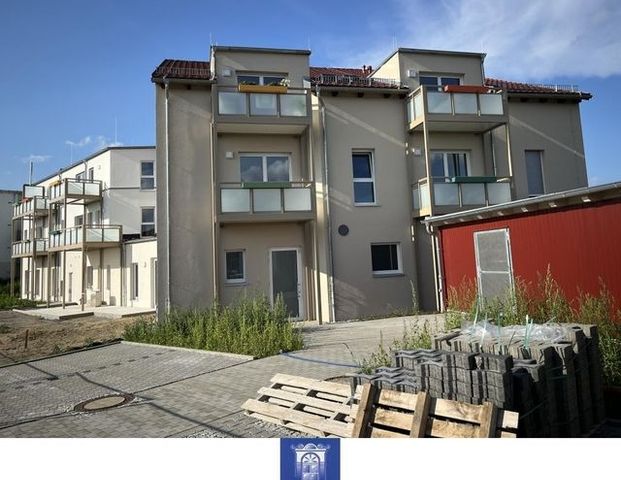 Individuell Wohnen im Erstbezug! Großes Wohnzimmer, schöner Balkon, modernes Bad! - Foto 1
