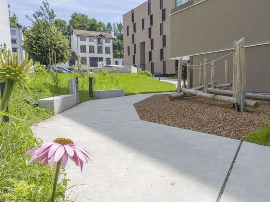 Appartement de 2.5 pièces au 1er étage avec balcon - Photo 1