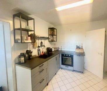 Helle Souterrain-Wohnung mit Terrasse & Einbauküche! - Foto 4