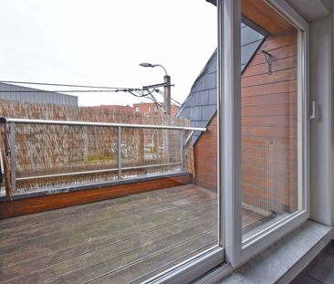 RUIM APPARTEMENT MET TWEE SLAAPKAMERS EN GARAGE - Photo 4