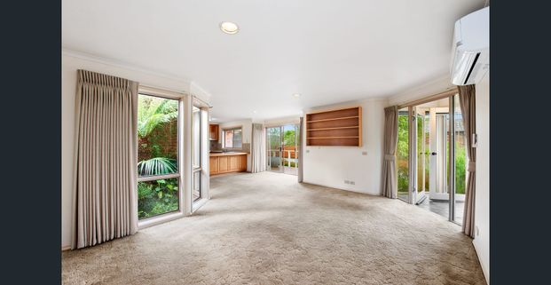 Two-Bedroom Townhouse with Tranquil Garden Setting - Photo 1