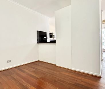 Spacious Townhouse-Style Living in a Sought-After Complex - Photo 1