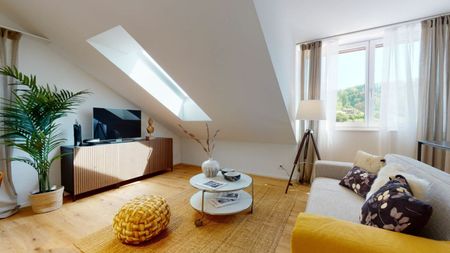 Ein­zig­ar­ti­ge Dach­ge­schoss­woh­nung im Ei­gen­tums­stan­dard - Photo 2