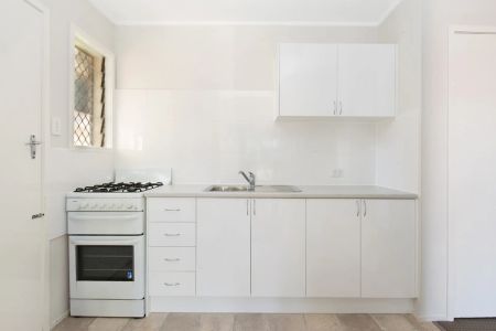 Well-Located Two-Bedroom Apartment with Carport - Photo 3