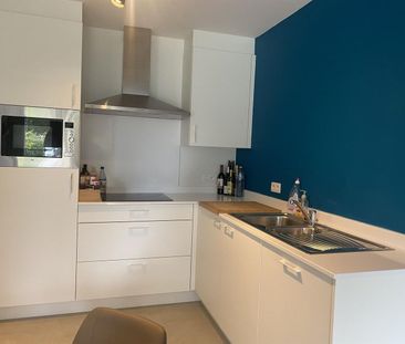 Gelijkvloersappartement met 1 slaapkamer en tuintje - Photo 2