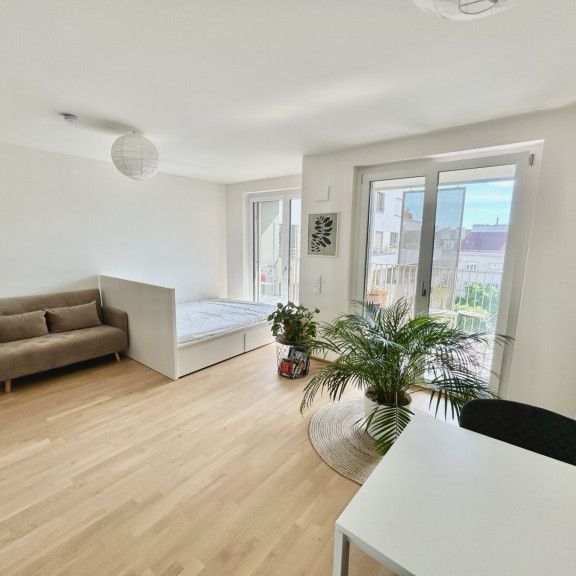 Schöne 1-Zi.-Wohnung im 5. OG mit Blick in den Innenhof - Foto 1