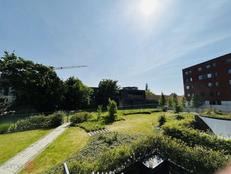 Mooi recent appartement met 2 slaapkamers, staanplaats en kelder op 3 min. van het station van Leuven. - Photo 2