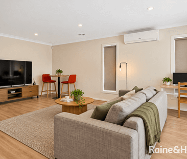 Modern 4-Bedroom Family Home with Comfort and Convenience! - Photo 2