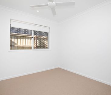 Spacious 4-Bedroom Home in the Heart of Redbank Plains! - Photo 2