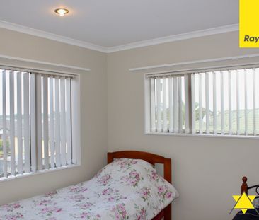 This immaculate four bedroom home is both private and welcoming and... - Photo 3