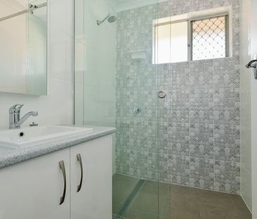 Renovated unit in sought after location - Photo 4