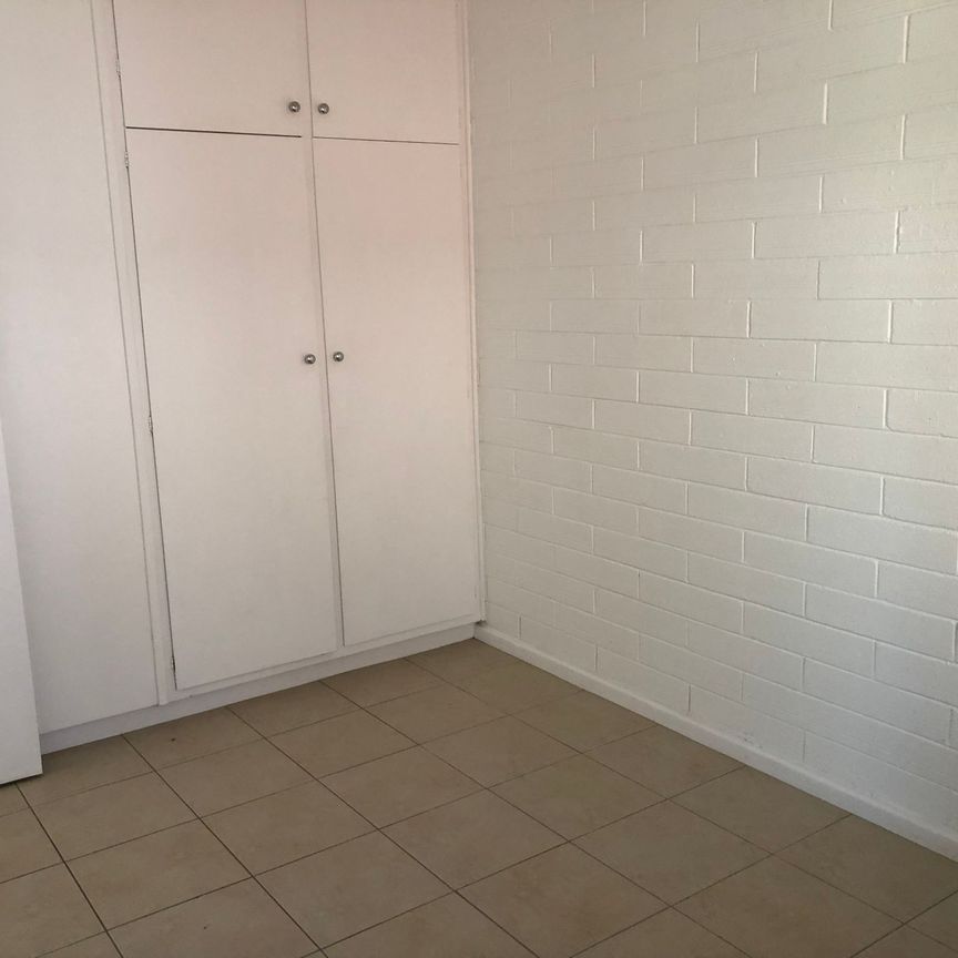 Two Bedroom Upstairs Unit - Photo 1
