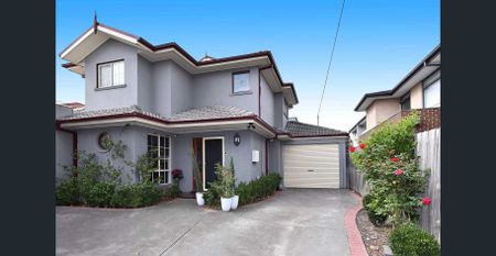 Stunning Two-Level Family Home in Prime Airport West Location - Photo 3