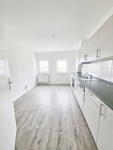 Dachgeschosswohnung - Foto 3