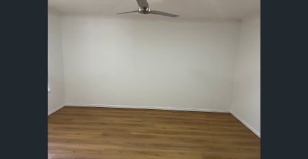 Freshly painted with new flooring available now! PLUS one week rent free to approved applicant!! - Photo 2