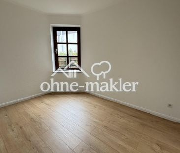 Großzügige Erdgeschosswohnung mit Garten und Kamin in ruhiger Lage ... - Photo 1