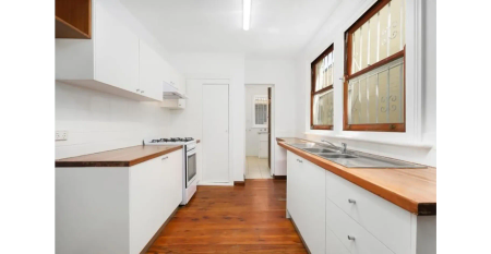 Three Bedroom Home with Parking in Ultra-Convenient Locale - Photo 2