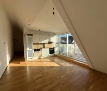 1-Zimmer-Wohnung mit großer Terrasse im DG in ländlicher Ruhelage - schöner Neubau - zu mieten in 1230 Wien - Photo 2