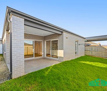 Stylish Four-Bedroom Family Home with Space, Comfort and Convenience - Photo 5