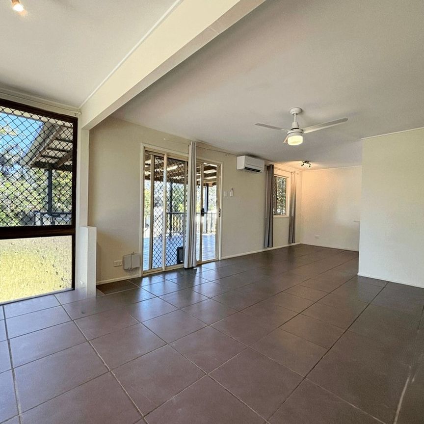 Family Home with Large Yard + Large Living Areas - Photo 1