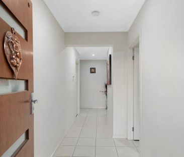 Beautifully Designed Home with Effortless Upkeep - Photo 1