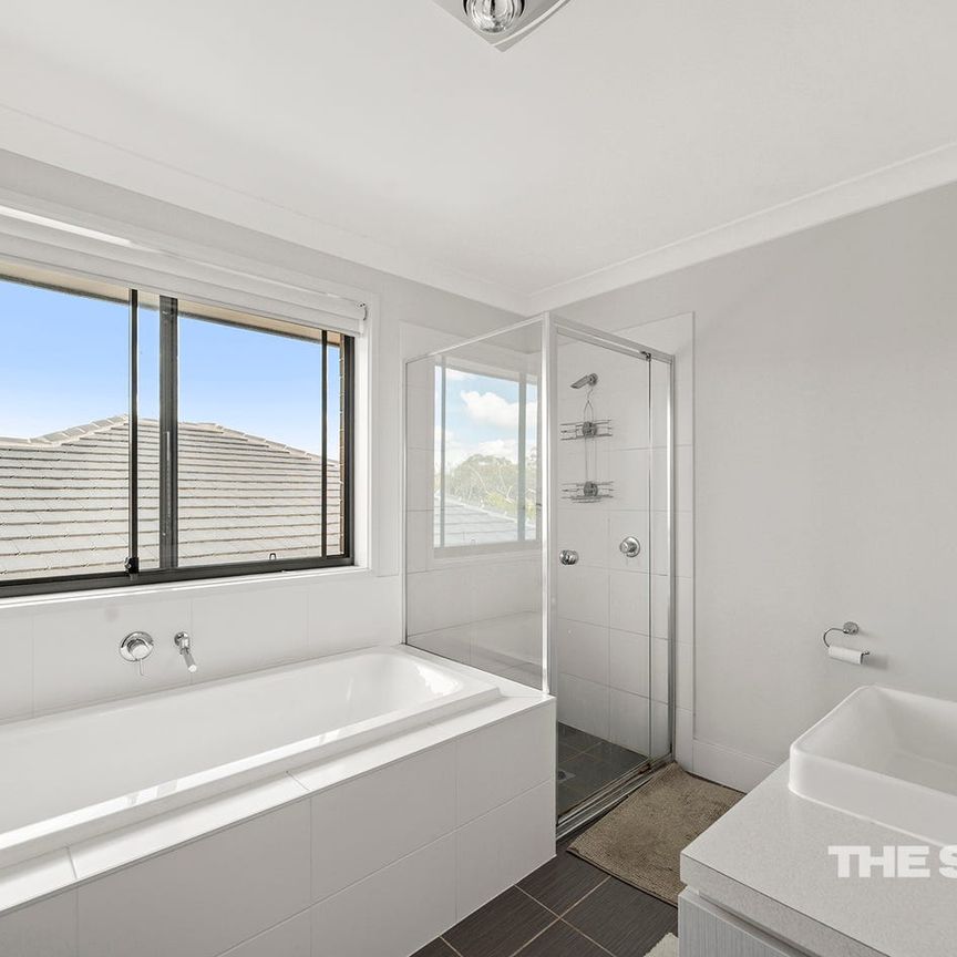 Spacious Family Home with Multiple Living Areas & Modern Comforts - Photo 1