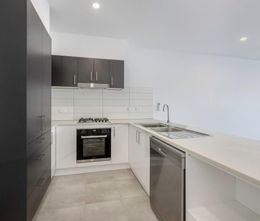 MODERN MORISSET LIVING WITH A SEPARATE MEDIA ROOM - Photo 5