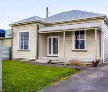 Tidy 3-Bedroom Home with Large Covered Deck - Photo 5