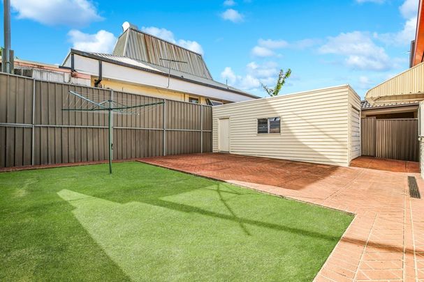 Tastefully Renovated, Character-Filled And Private, Centrally Positioned Three Bedroom Plus Sunroom Family Home In A Prime, Park-Side Location - Photo 1