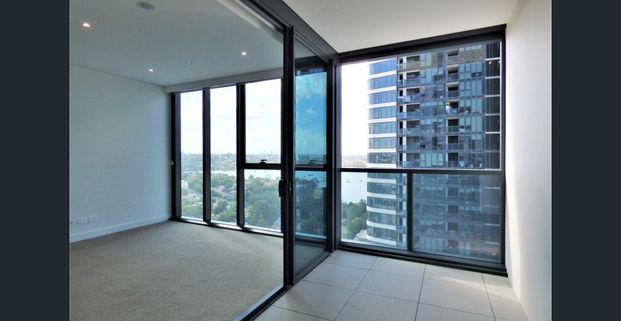 Rhodes Central 1 bed east facing with city & water views - Photo 1