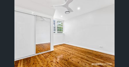 Move-In Ready Modern Family Home with Backyard in Peaceful Blaxland Location - Photo 4