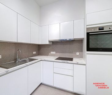 Gerenoveerd gelijkvloers appartement met tuin en garage - Photo 5