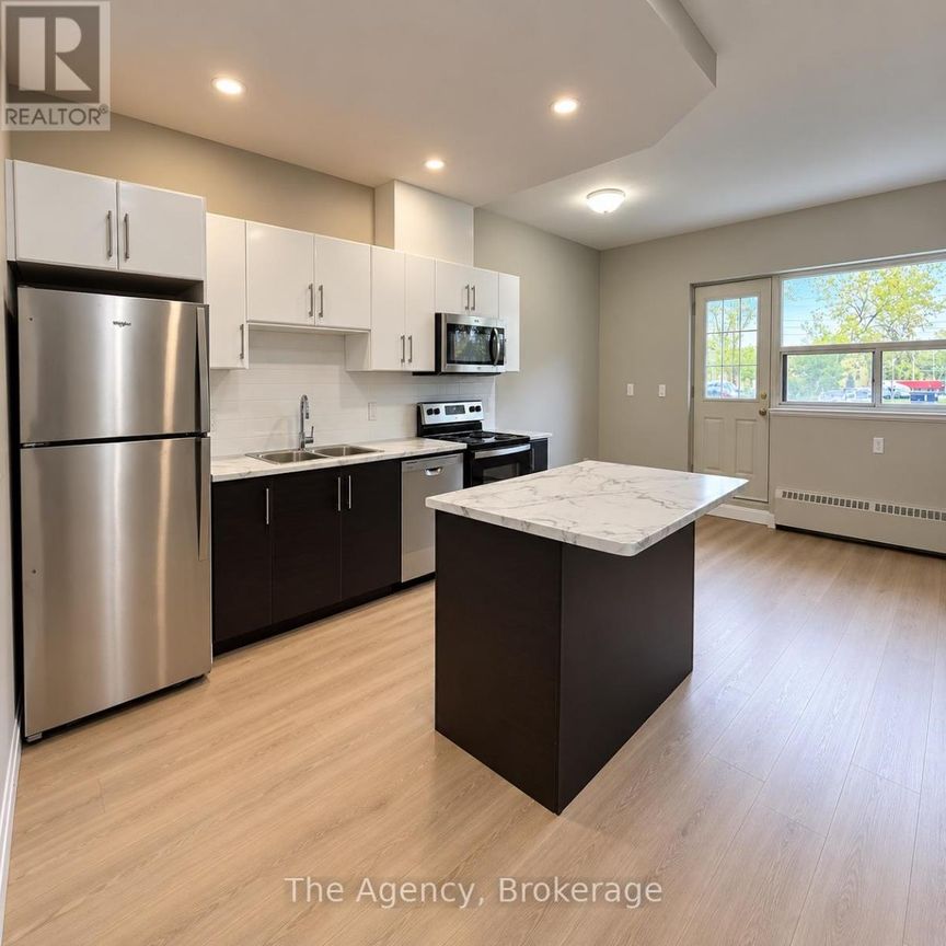 102 - 45 PAISLEY BOULEVARD W, Mississauga, Ontario, L5B1E4 - Photo 1