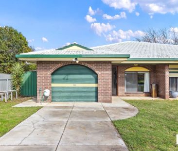 Modern 2-Bedroom Unit with Low-Maintenance Yard - Photo 4