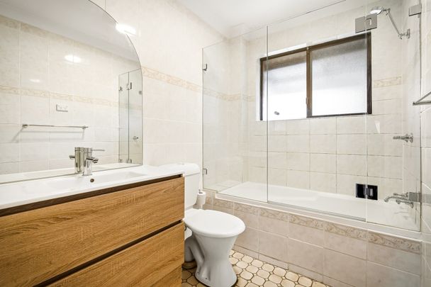 Air-Conditioned Renovated Two-Bedroom Unit with Two Balconies! - Photo 1