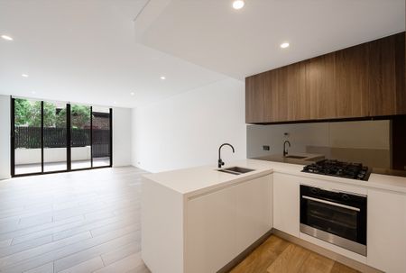 Split-Level I Courtyard Apartment I Lockup Garage - Photo 3