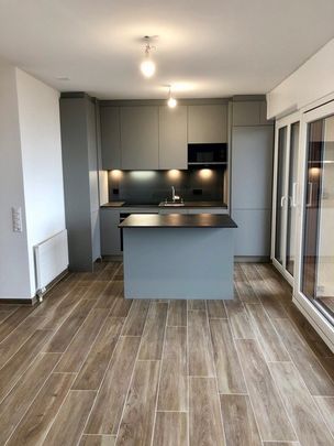 Appartement de 2.5 pièces au rez-de chaussée avec terrasse - Photo 1