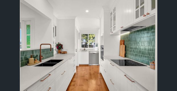 Fully Renovated Dual-Level Home with Flexible Living & EV Charging - Photo 1