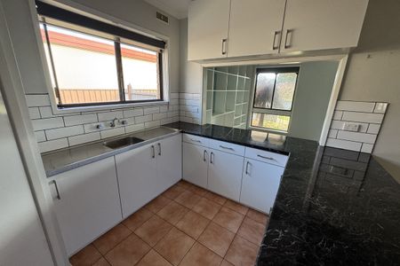 Spacious 3-Bedroom Home with Large Shed! - Photo 5